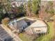 Community pool with a pool house and surrounding area at 207 Hampshire Downs Dr, Morrisville, NC 27560