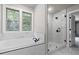 Relaxing bathroom with soaking tub and a large walk-in shower at 2112 Stanchion St, Haw River, NC 27258