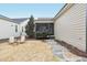 Landscaped backyard with stone pathway and fire pit at 213 Quarter Gate Trace, Chapel Hill, NC 27516