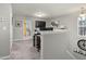 Upstairs hall with a view of a home office and carpeted flooring at 235 Blair Hills Rd, Wendell, NC 27591