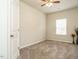 Simple bedroom with ceiling fan and neutral decor at 2489 Valley Dr, Clayton, NC 27520