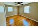 Spacious bedroom with hardwood floors and ceiling fan at 2923 Mckinney St, Burlington, NC 27217