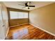 Spacious bedroom with hardwood floors and ceiling fan at 2923 Mckinney St, Burlington, NC 27217