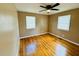 Spacious bedroom featuring hardwood floors and dual windows at 2923 Mckinney St, Burlington, NC 27217