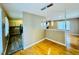 Bright dining area with hardwood floors and modern light fixture at 2923 Mckinney St, Burlington, NC 27217