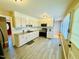 Renovated kitchen with granite countertops and new cabinetry at 2923 Mckinney St, Burlington, NC 27217