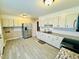 Updated kitchen featuring stainless steel appliances and granite countertops at 2923 Mckinney St, Burlington, NC 27217