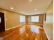 Hardwood floor living room with neutral walls and recessed lighting at 2923 Mckinney St, Burlington, NC 27217