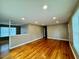 Spacious living room, hardwood floors, recessed lighting at 2923 Mckinney St, Burlington, NC 27217