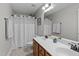 Bathroom with double vanity and shower/tub combo at 300 Duchart Ln, Fuquay Varina, NC 27526