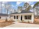 Charming white house with a front porch at 305 E Pope Ave, Kenly, NC 27542