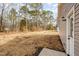 New construction home with a large backyard and access door at 307 E Pope Ave, Kenly, NC 27542