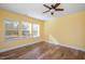 Bright bedroom with wood floors and windows at 312 Trinity Creek Dr, Holly Springs, NC 27540