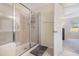 Bathroom with a shower/tub combo and glass enclosure at 336 Westgrove Ct, Durham, NC 27703