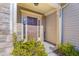 Inviting front door entrance with stone accents and landscaping at 336 Westgrove Ct, Durham, NC 27703