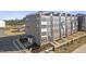 Aerial view of townhome community showing building exteriors and landscaping at 414 Gaston Park Ln # 100, Wake Forest, NC 27587