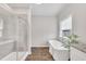 Bathroom with soaking tub and walk-in shower at 407 Sixth St, Wake Forest, NC 27587