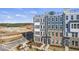 Aerial view of townhome community, showcasing building exteriors at 410 Gaston Park Ln # 100, Wake Forest, NC 27587