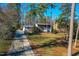 House and driveway aerial view showcasing landscaping at 4105 Glen Laurel Dr, Raleigh, NC 27612