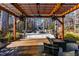 Pergola with fire pit and wooden deck at 4105 Glen Laurel Dr, Raleigh, NC 27612