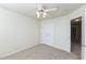 Well-lit bedroom featuring a double door closet at 4108 Cherry Blossom Cir, Durham, NC 27713