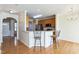 Kitchen with breakfast bar and hardwood floors at 4108 Cherry Blossom Cir, Durham, NC 27713