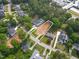 Aerial view of a vacant lot, showcasing its location near established homes and lush greenery at 4112 Rockingham Dr, Raleigh, NC 27609