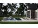 Luxury pool with spa and water feature; screened porch with fireplace at 4112 Rockingham Dr, Raleigh, NC 27609