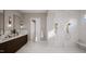 Bathroom with double sinks and large walk-in shower at 4112 Rockingham Dr, Raleigh, NC 27609
