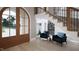 Bright entryway with double doors and sitting area at 4112 Rockingham Dr, Raleigh, NC 27609