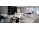 Game room with wet bar and comfortable seating area at 4112 Rockingham Dr, Raleigh, NC 27609