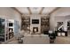 Spacious living area featuring built-in shelving and fireplace at 4112 Rockingham Dr, Raleigh, NC 27609