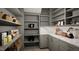 Well-organized pantry with ample shelving and countertop space at 4112 Rockingham Dr, Raleigh, NC 27609