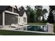 Relaxing pool area with lounge chairs and a view of the house at 4112 Rockingham Dr, Raleigh, NC 27609