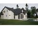 Home exterior showcasing backyard pool and screened porch at 4112 Rockingham Dr, Raleigh, NC 27609