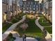 Community courtyard with grilling station and walking paths at 412 Gaston Park Ln # 100, Wake Forest, NC 27587