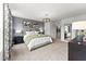 Spacious main bedroom with plush carpeting and ensuite bath at 412 Gaston Park Ln # 100, Wake Forest, NC 27587