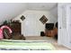 Bedroom with sloped ceilings and built-in shelving at 414 Ash Lily Ct, Nashville, NC 27856