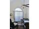 Bedroom with hospital bed, recliner, and large window at 414 Ash Lily Ct, Nashville, NC 27856