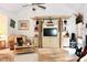 Cozy living room with a vaulted ceiling and a custom entertainment center at 414 Ash Lily Ct, Nashville, NC 27856