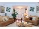 Bright living room with hardwood floors and neutral decor, offering a comfortable and inviting space at 414 Ash Lily Ct, Nashville, NC 27856