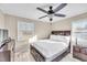 Spacious bedroom with double bed and ceiling fan at 424 Hawthorne Ln, Burlington, NC 27215