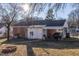 Brick house with carport and fenced backyard at 424 Hawthorne Ln, Burlington, NC 27215