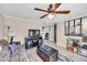 Spacious living room with hardwood floors and a ceiling fan at 424 Hawthorne Ln, Burlington, NC 27215