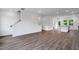 Spacious living room with hard surface floors, bright lighting, and open floorplan at 433 Rowe Way, Knightdale, NC 27545