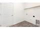 Laundry room with shelving and hookups at 46 Mable Court # 21P, Lillington, NC 27546