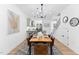 Elegant dining room with a wooden table and chandelier at 4811 Gossamer Ln # 102, Raleigh, NC 27616