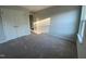 Spacious bedroom with carpet flooring and double door closet at 5002 Cambrey Dr # 2, Durham, NC 27703