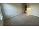 Bright bedroom with carpet flooring and window at 5002 Cambrey Dr # 2, Durham, NC 27703