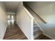 Bright entryway with hardwood floors and staircase at 5002 Cambrey Dr # 2, Durham, NC 27703